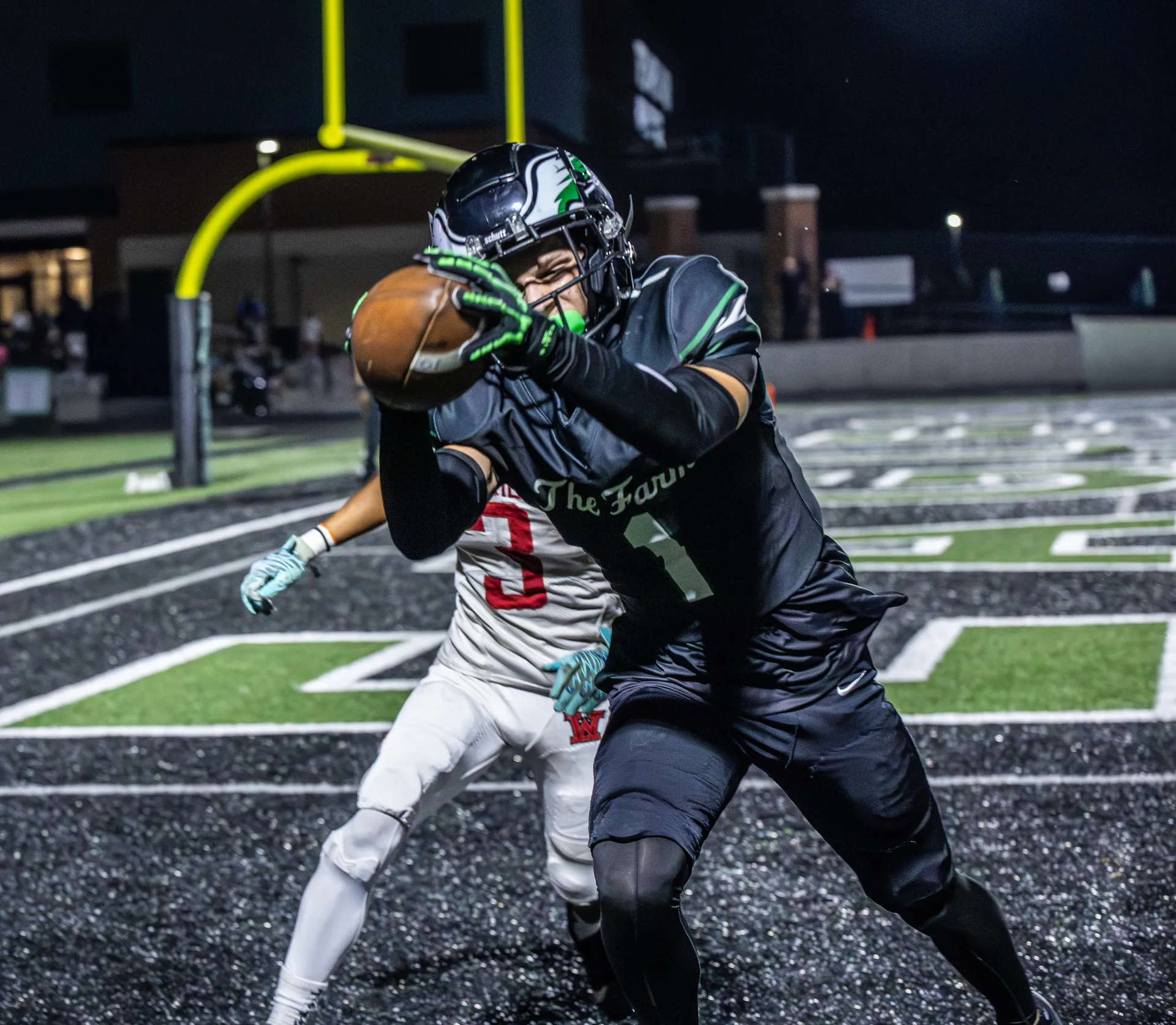 All-Conference receiver Patrick Ayers hauls in a catch near the end zone for Orchard Farm