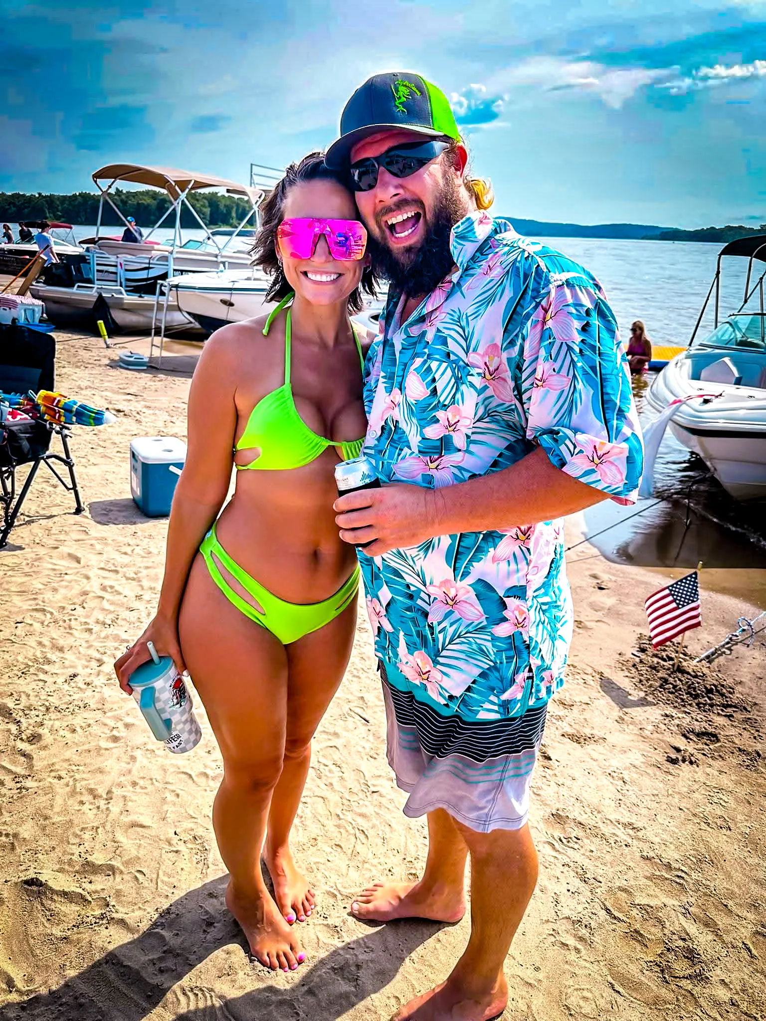 Kayla Zeller and Dave Hill on a sandbar beach along the Mississippi River
