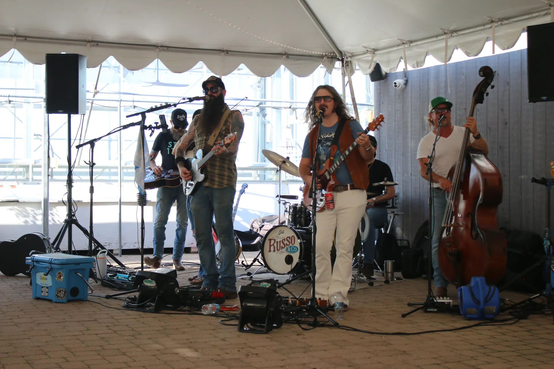 Russo & Co. performing under the tent at Shire Lane Estate