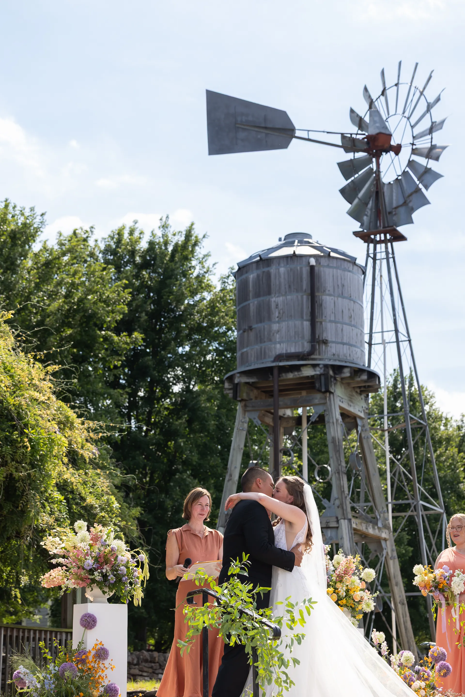 Kacey and Kenny share their first kiss in front of the windmill and water tower