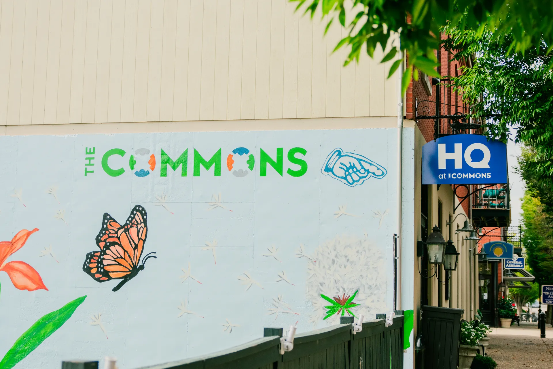 The Commons mural and the new HQ at The Commons sign in New Town, St. Charles, Missouri