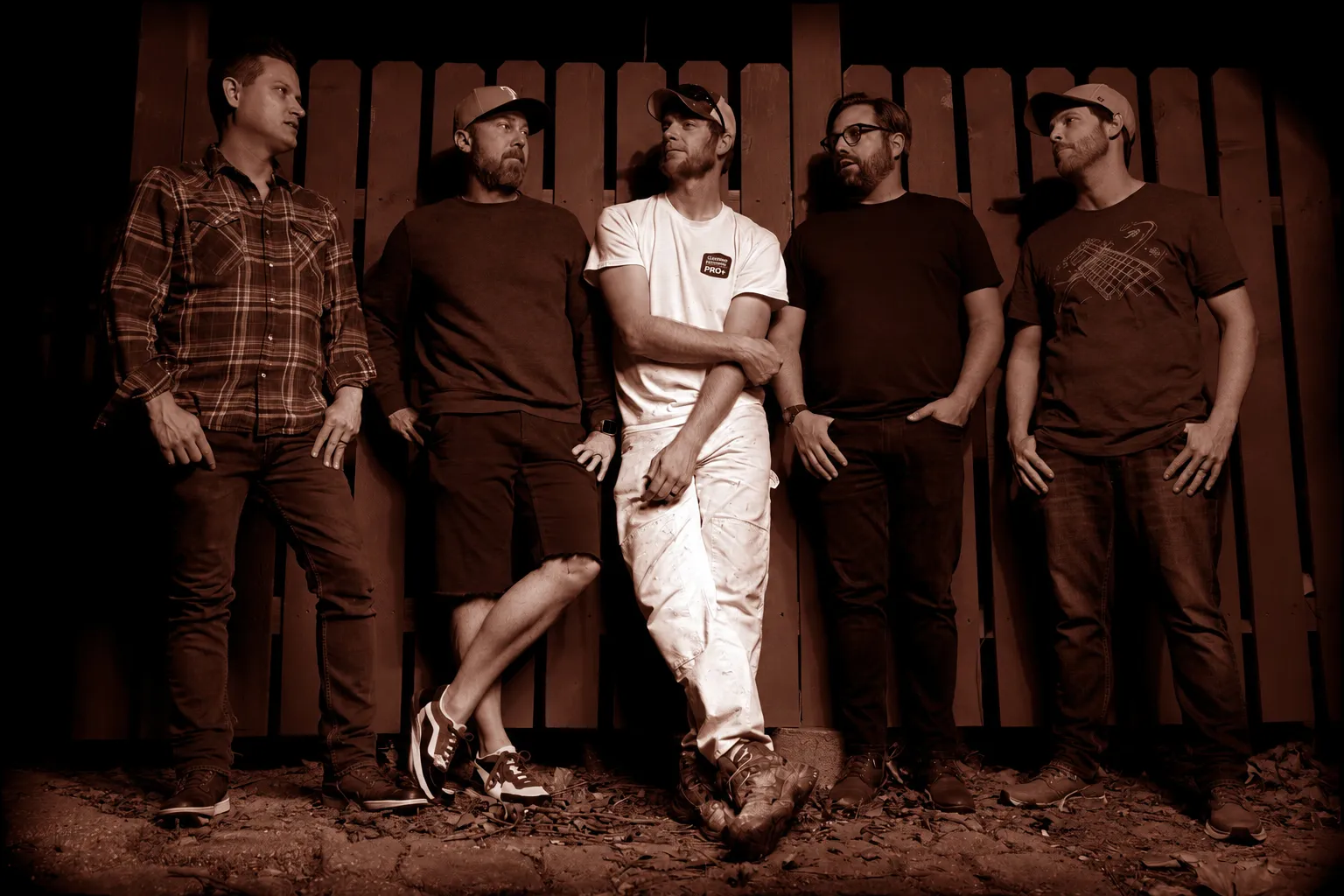 The five members of The Lonesome Whistle Band posing together