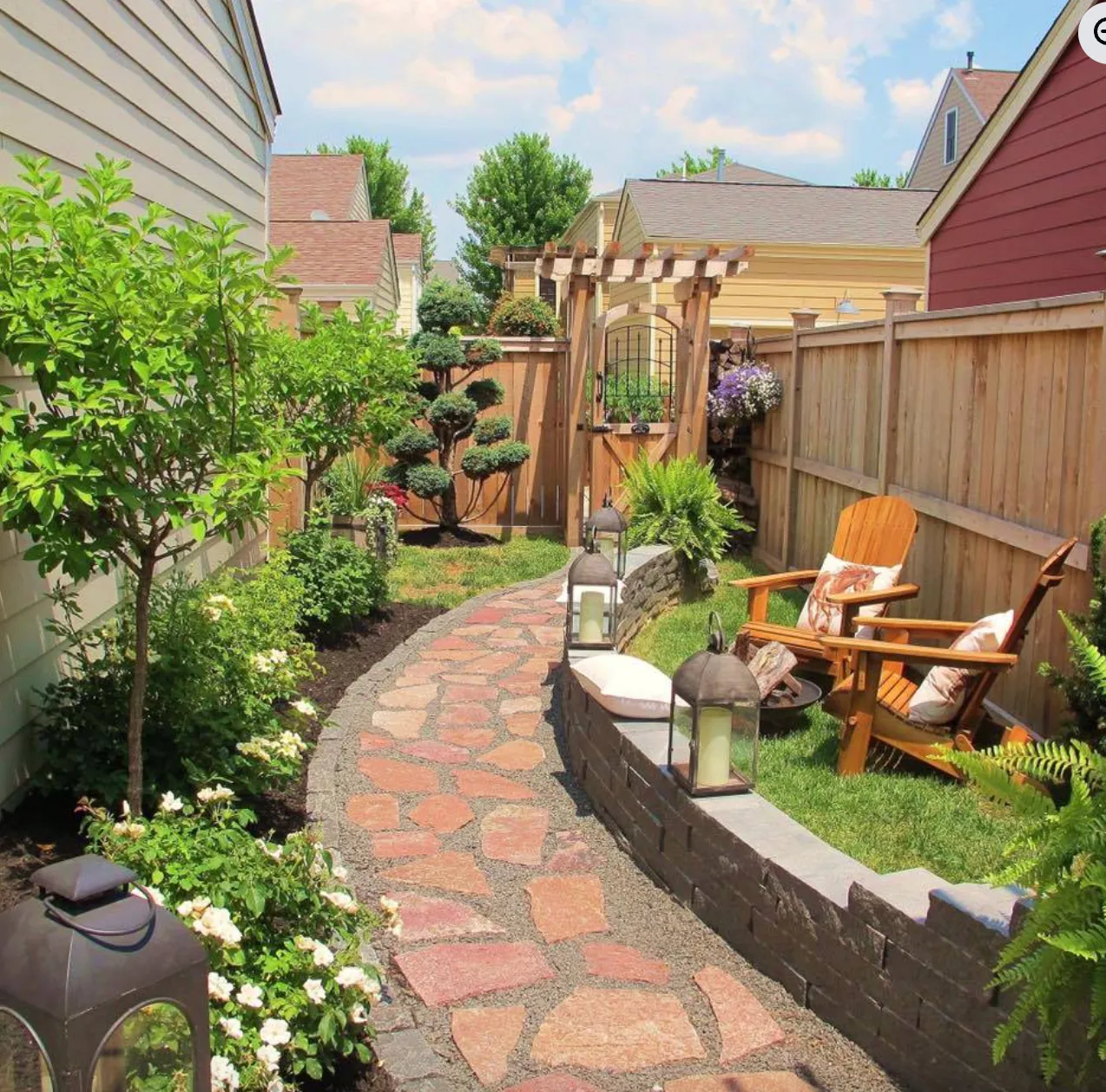 A lush resident garden overflowing with summer blooms