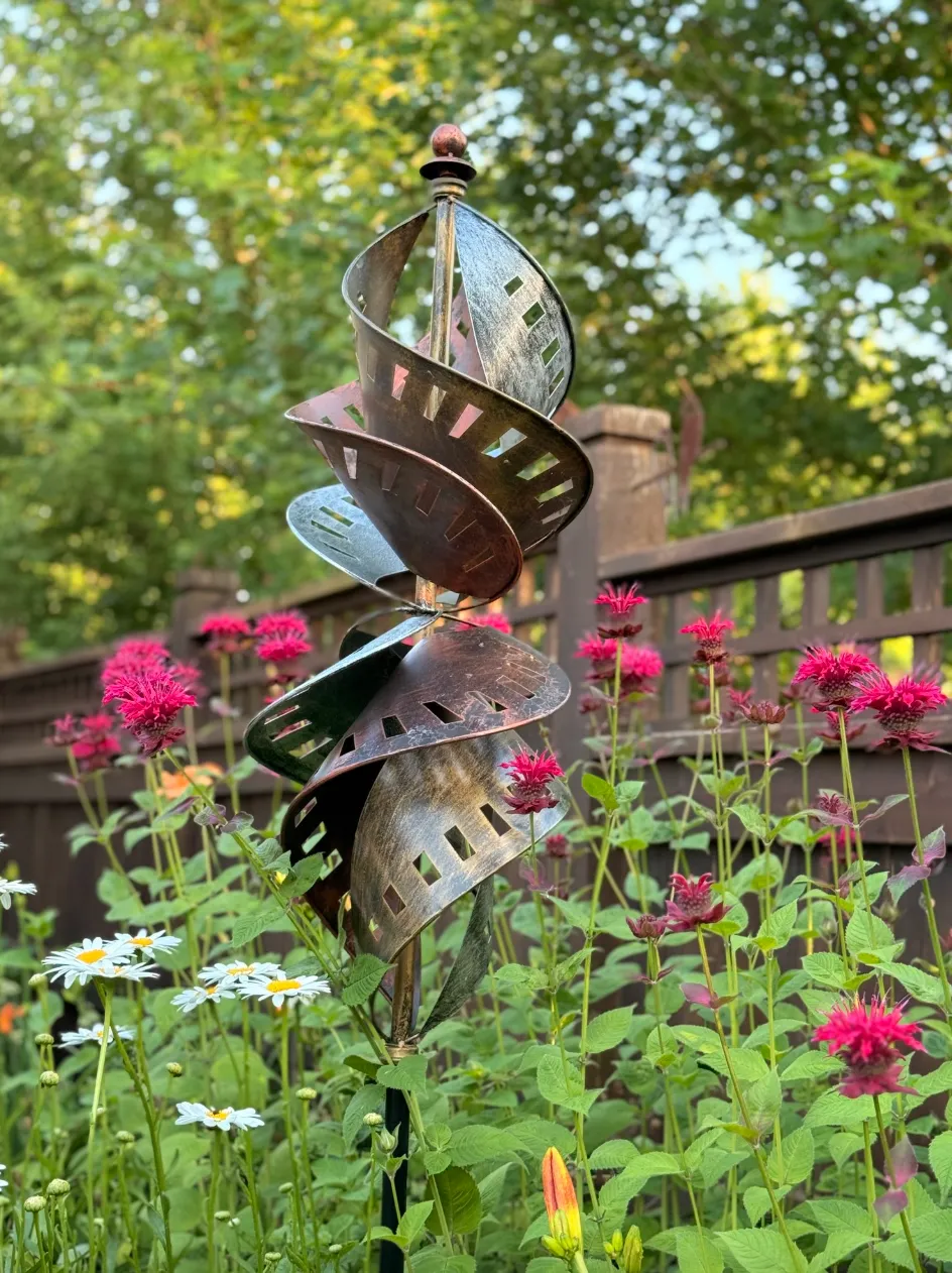 An elegant outdoor entertaining space with container gardens