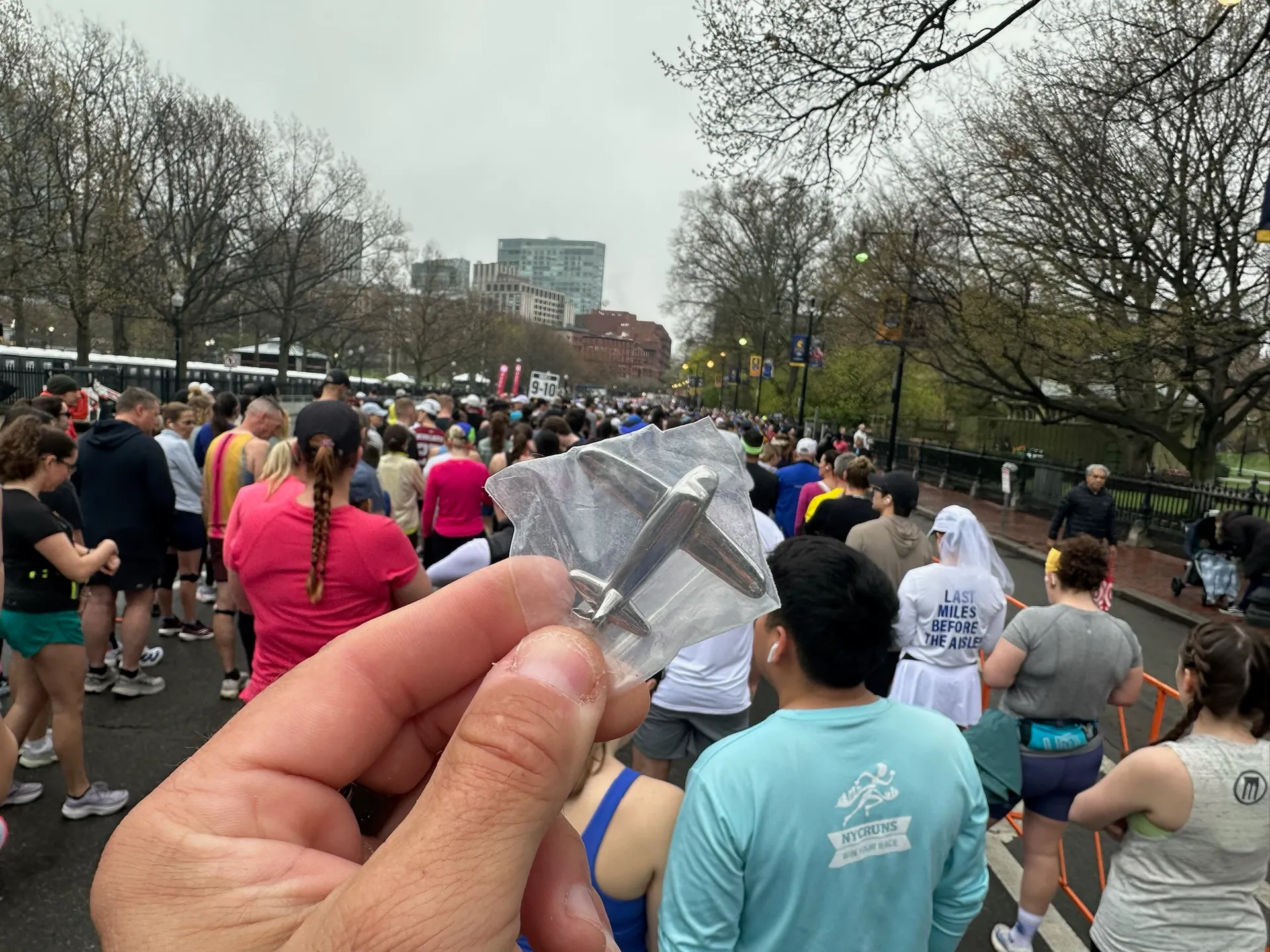 The small airplane carrying his father's ashes, held at the Boston Marathon start line